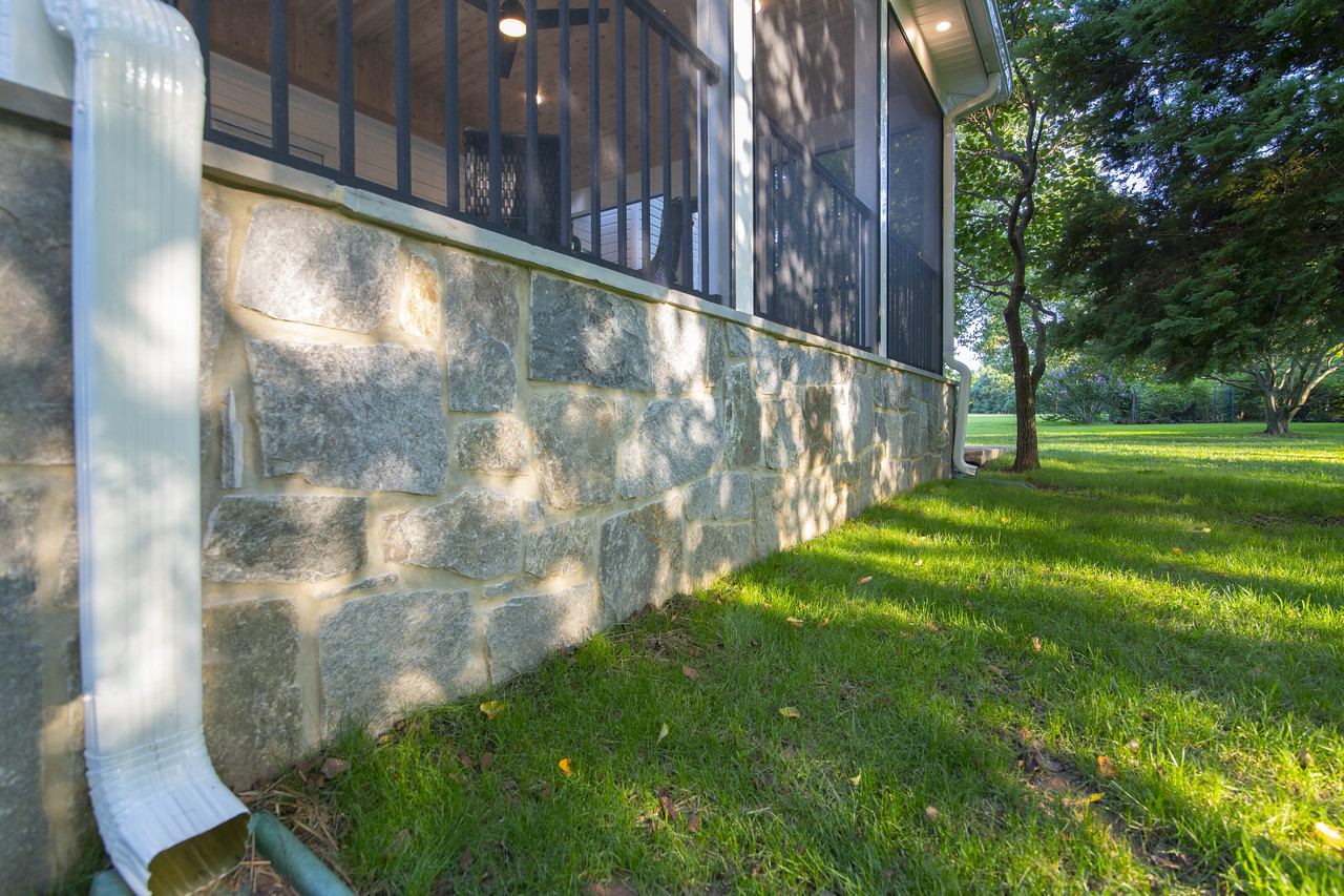 Fulton screened porch, Trex deck, and flagstone patio